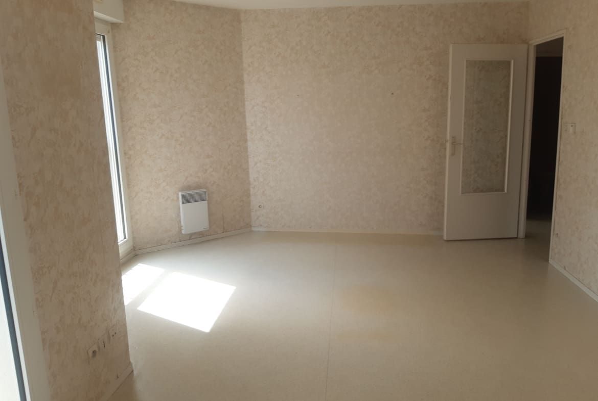 Photo 2 salle de séjour T2 • Quartier Marie de Bourgogne