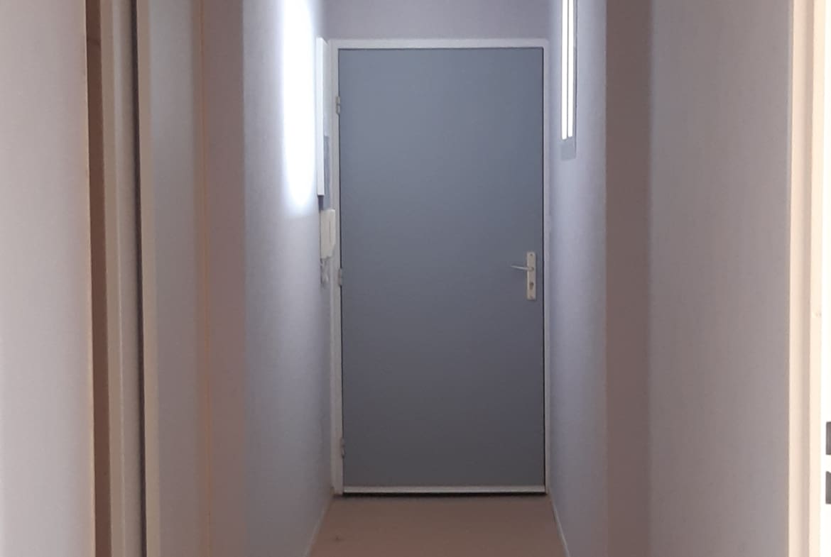 Photo hall d'entrée T2 • Quartier Marie de Bourgogne