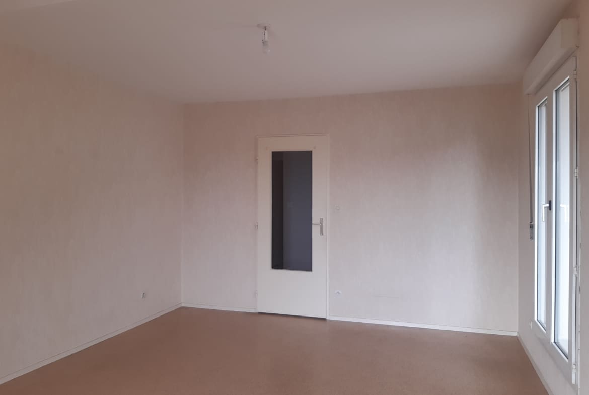 Photo 2 salle de séjour T2 • Quartier Marie de Bourgogne