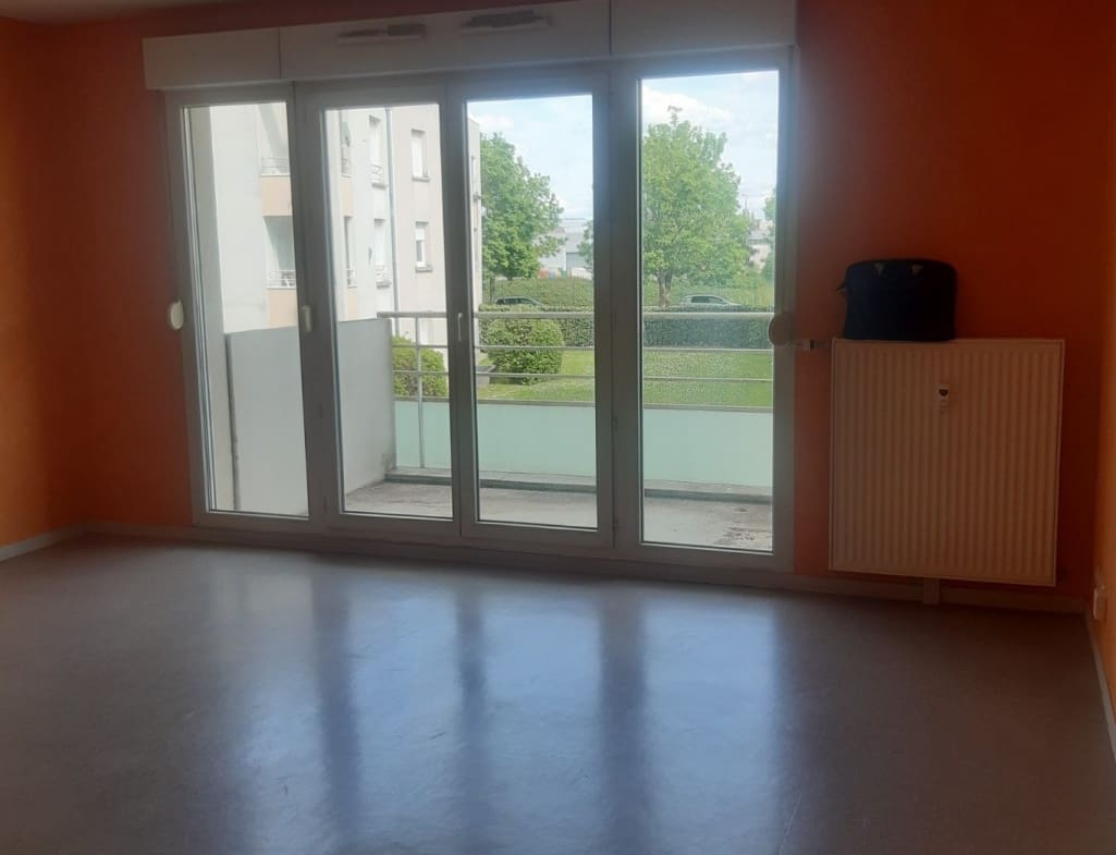 Photo 3 salle de séjour T4 • Lucien Hérard