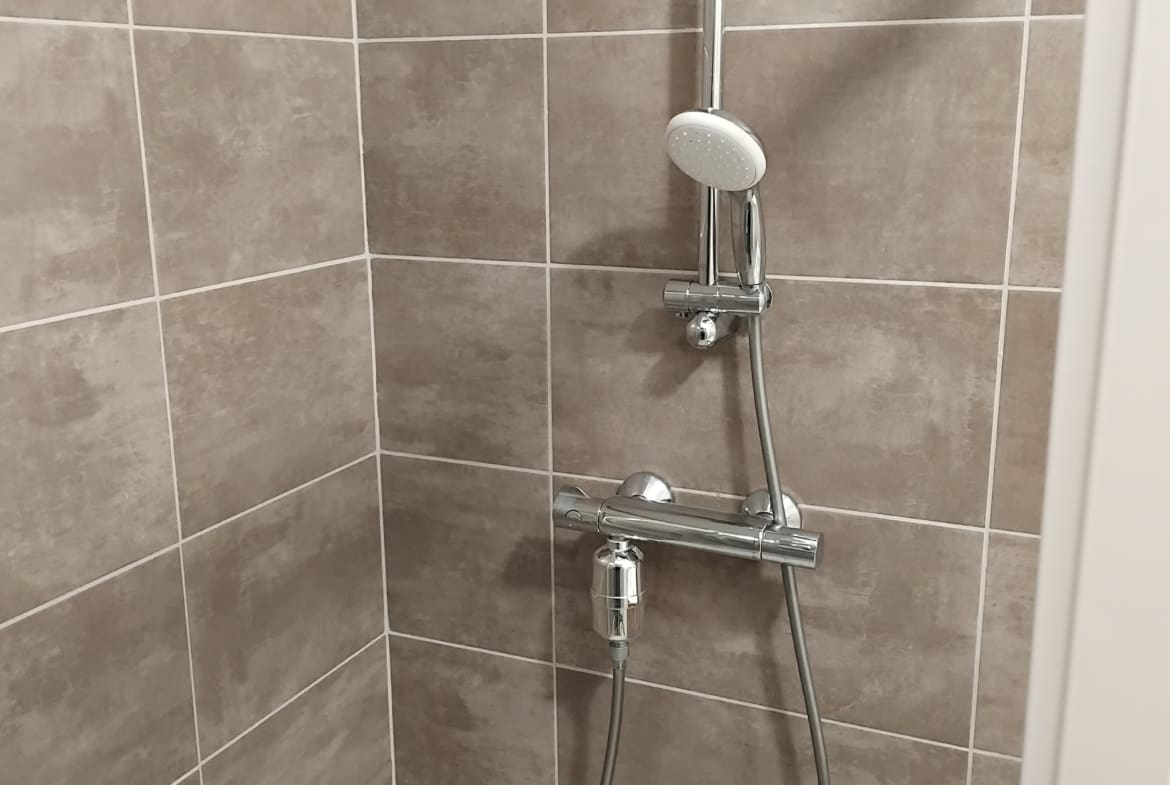 Photo pommeau douche T3 • Quartier Arsenal - DIJON